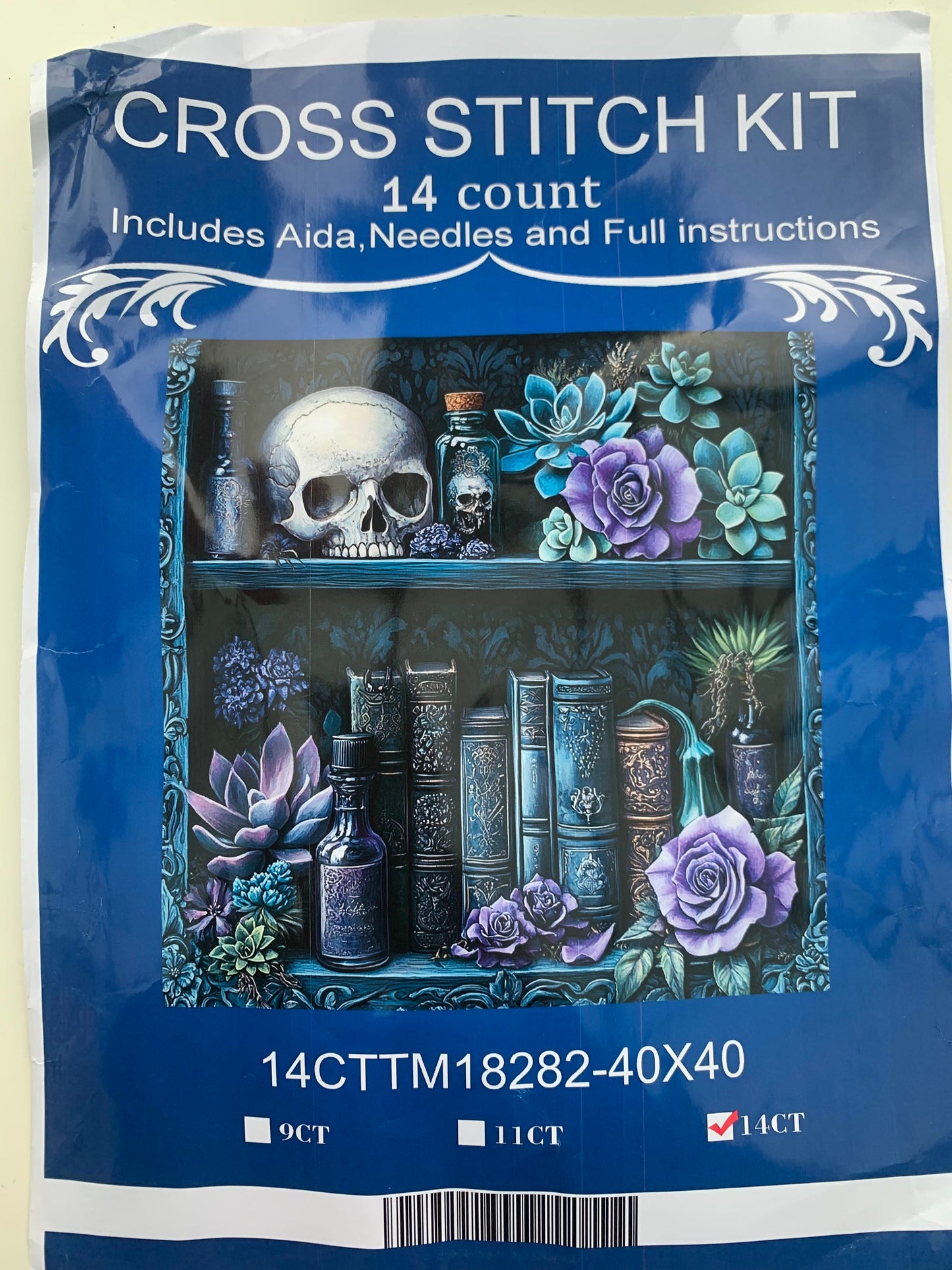 Skull and bookcase printed cross stitch kit - 14 count